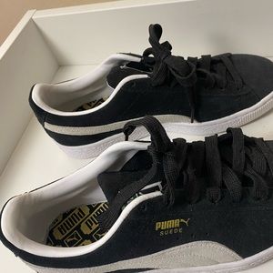 Puma black shoes.